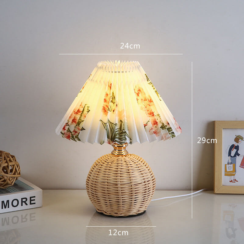 Lampe de table plissée en rotin Lighteme