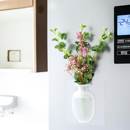 This is a removable silicone vase that can stick to any flat surface