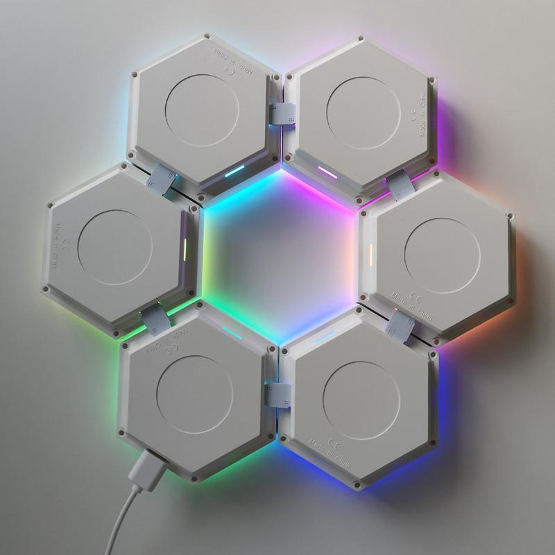 Then simply display on any surface or wall with the included sticky pads or with nails