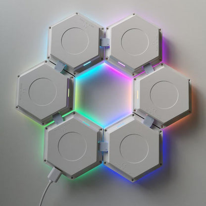 Then simply display on any surface or wall with the included sticky pads or with nails