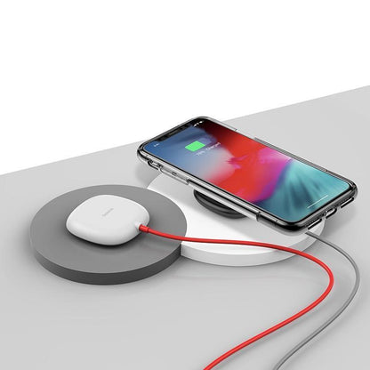 The charger, made of plastic and silicone is small,
