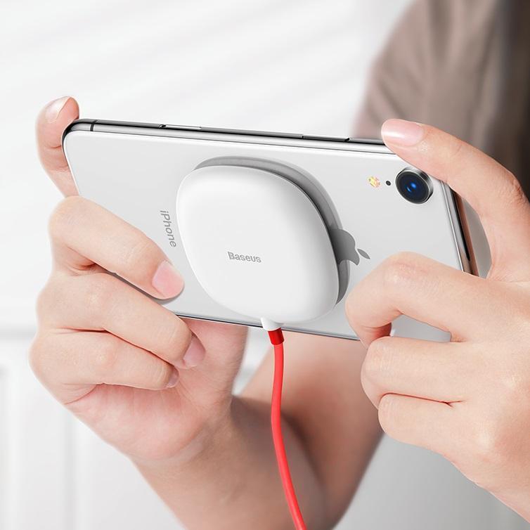 The charger, made of plastic and silicone is small,