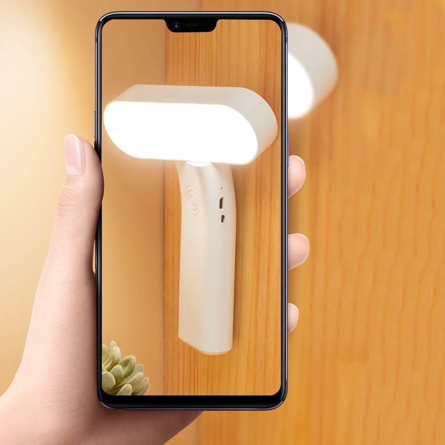 Tragbare Lampe Lighteme mit Telefonhalterung