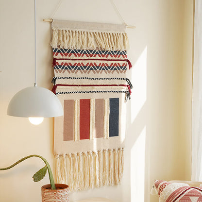 Tenture murale à pompons tissée à la main Lighteme à motifs géométriques