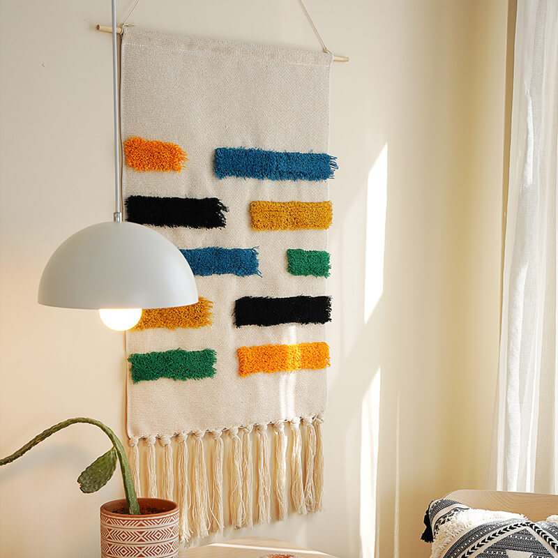 Tenture murale à pompons tissée à la main Lighteme à motifs géométriques