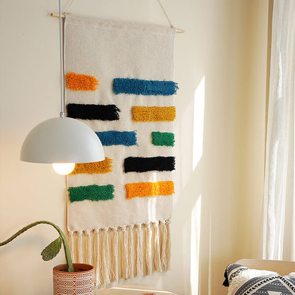 Tenture murale à pompons tissée à la main Lighteme à motifs géométriques