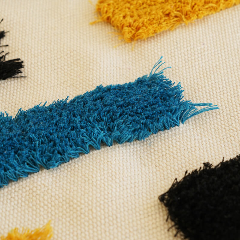 Tenture murale à pompons tissée à la main Lighteme à motifs géométriques