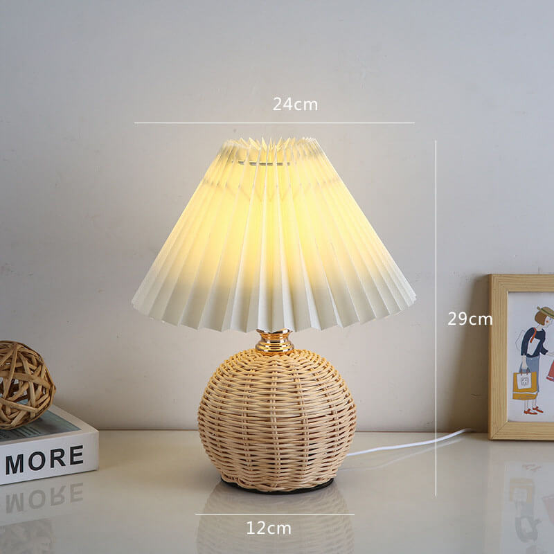 Lampe de table plissée en rotin Lighteme