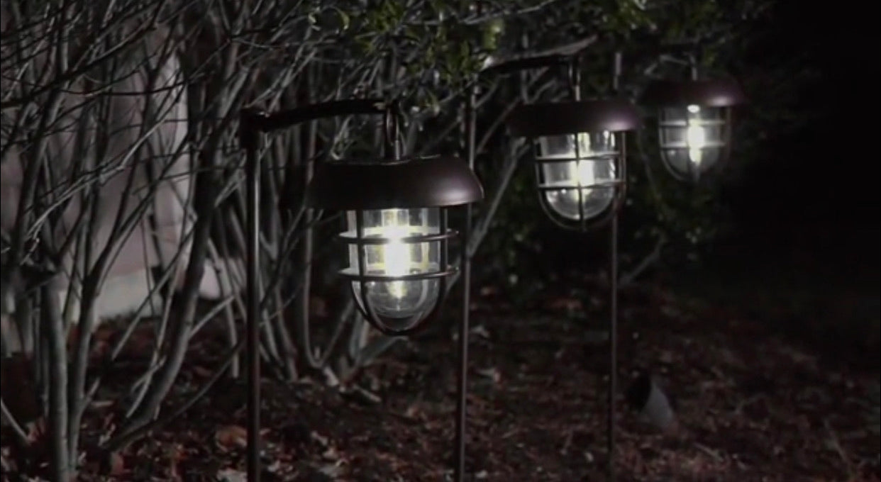 Lighteme LED Solar Hanging Lights on Shepherds Hook Metal Pole (Set of 4)